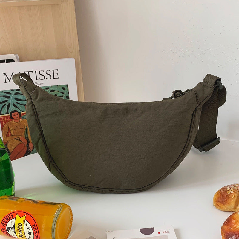 DMT | Halbmondförmige Tasche